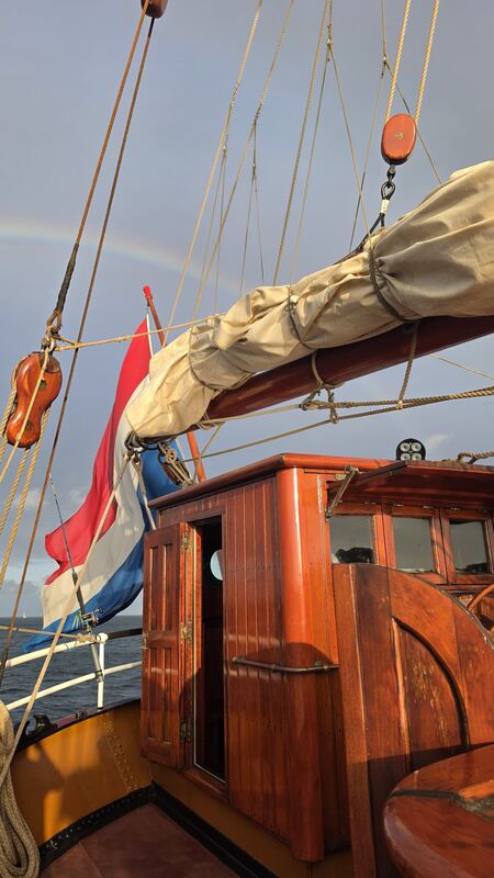 Dutch ensign, wheelhouse, and the tail of the rainbow