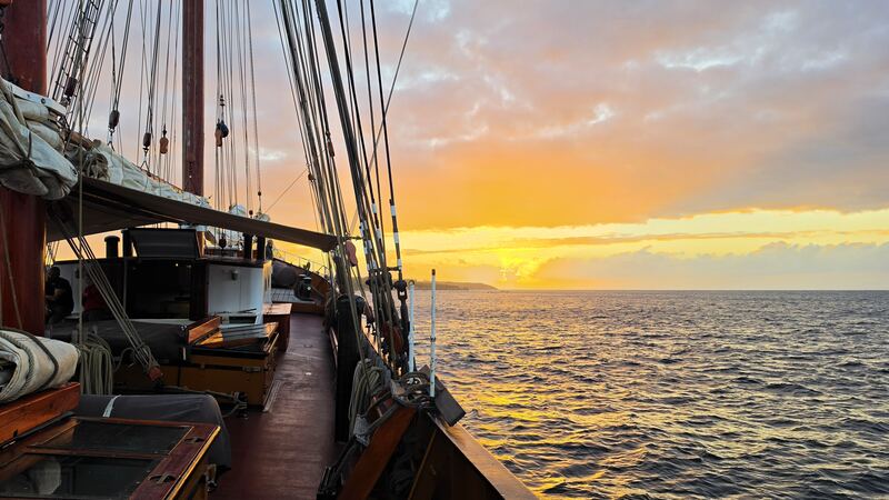 Sunset on deck, coast ahead